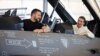 Președintele ucrainean, Volodimir Zelenski, și prim-ministra daneză, Mette Frederiksen, într-un avion de vânătoare de producție americană F-16 la baza aeriană Skrydstrup din Danemarca, pe 20 august 2023. 