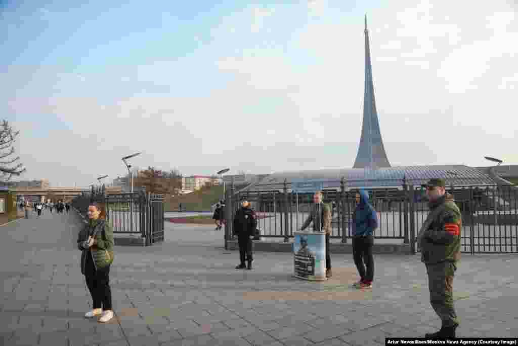 The booths, including this one outside Moscow’s Soviet-era Space Conquerer’s monument, are apparently part of an effort by the Kremlin to boost its foundering invasion of Ukraine without announcing another mass mobilization. 