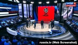 Кадр из дневного выпуска программы "60 минут" на телеканале "Россия 1" за 30 мая 2018 года