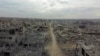 O imagine dintr-o dronă arată distrugerile dintr-un cartier rezidențial după retragerea forțelor israeliene din zonă, în orașul Gaza, 12 octombrie 2025.