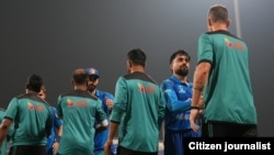 Afghan and Bangladeshi cricket players after October 12 match