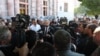 Armenia - Economy Minister Gevorg Papoyan talks to protesting drivers of Armenian heavy trucks, Yerevan, October 16, 2025.