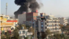 Smoke rising from a building in the Taimani area of Kabul after Pakistani air strikes.